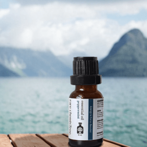 Peppermint essential oil with a calm background